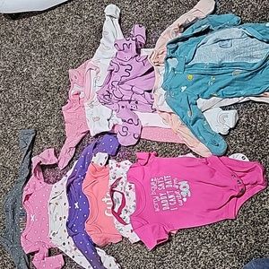 A lot of new born clothes